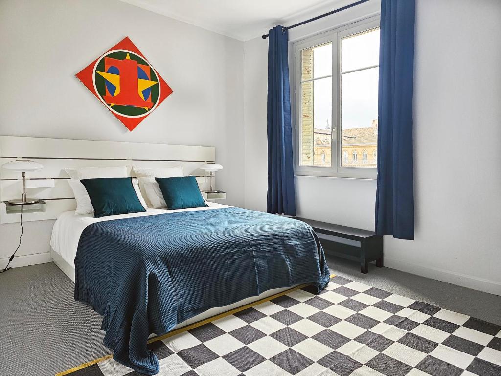 Postel nebo postele na pokoji v ubytování L'Idrac, Appartements en Hyper centre