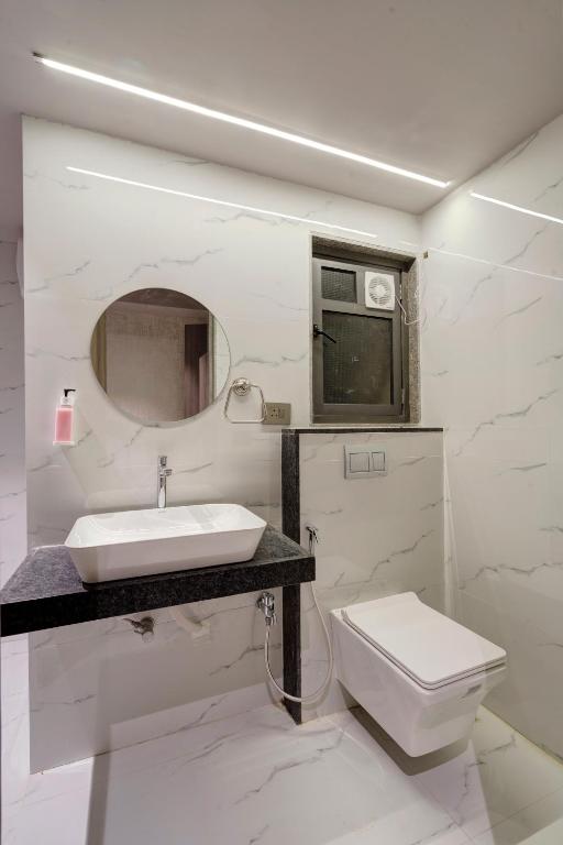 Koupelna v ubytování Hotel Sparsh Divine