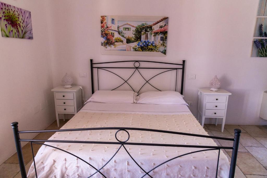 Postel nebo postele na pokoji v ubytování Masseria Caliani