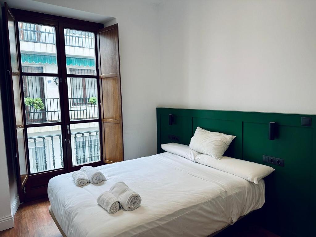 Ένα ή περισσότερα κρεβάτια σε δωμάτιο στο CATEDRAL SQUARE