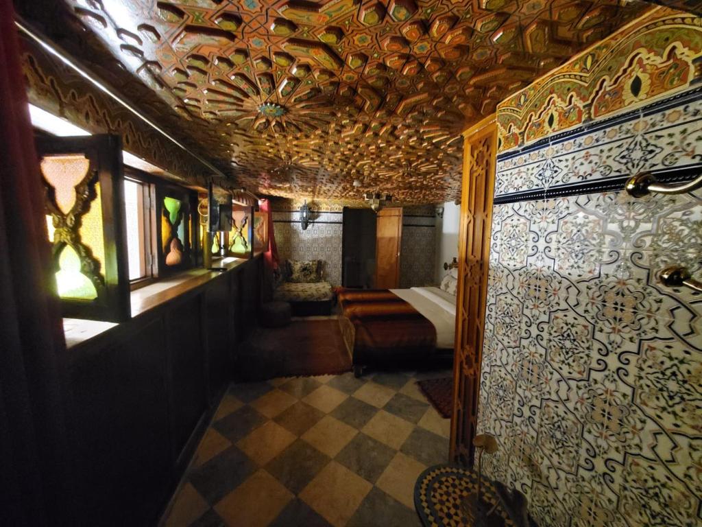 Postel nebo postele na pokoji v ubytování Riad Royal