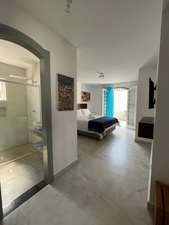 Postel nebo postele na pokoji v ubytování Casa Arte Cabore