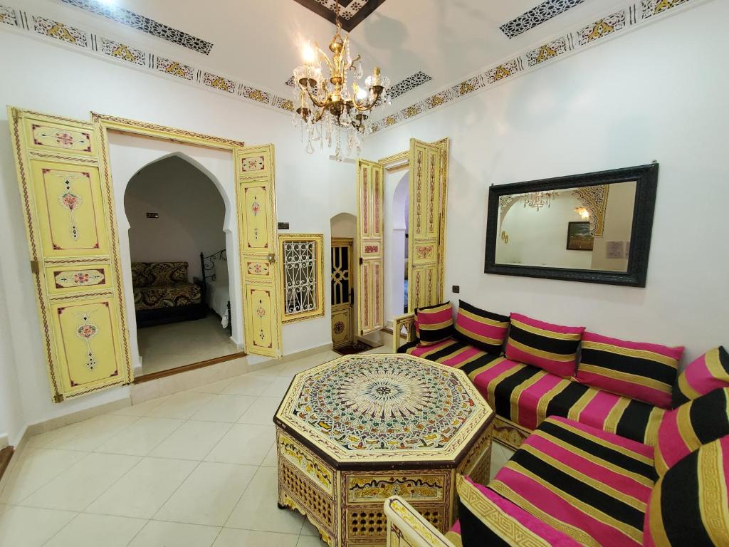 a living room with a couch and a table at Blue City in Chefchaouen