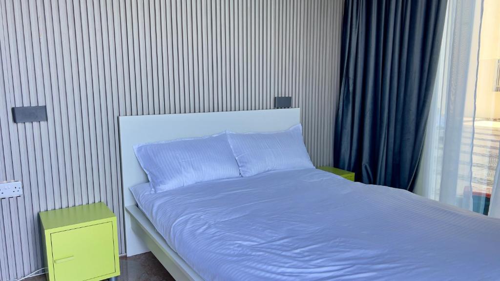 Voodi või voodid majutusasutuse Wadi Shab Beach Villa toas