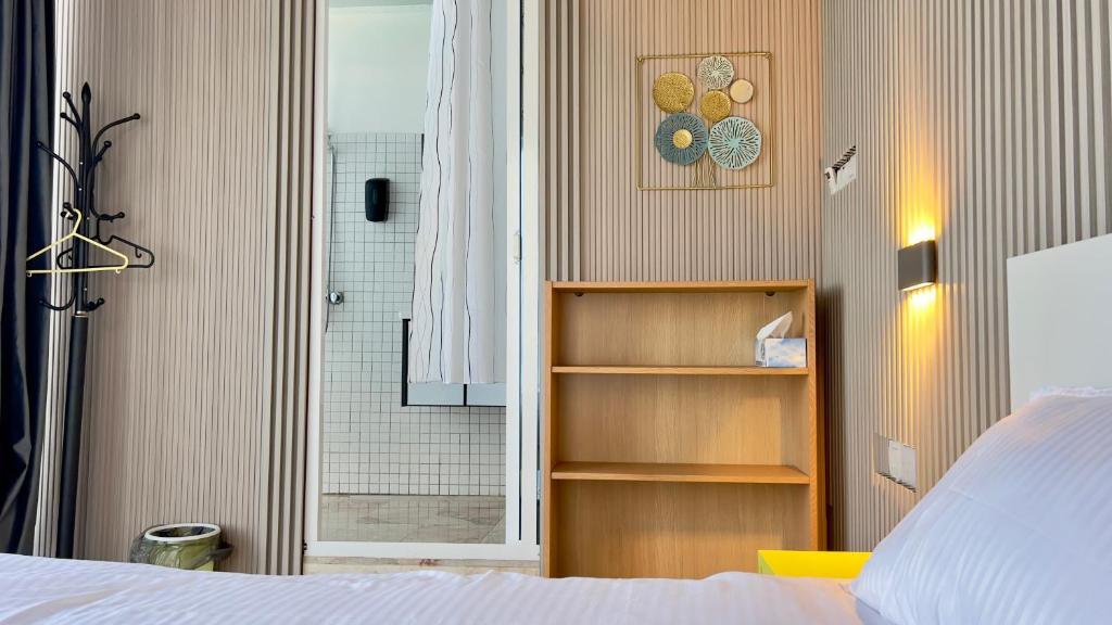 Voodi või voodid majutusasutuse Wadi Shab Beach Villa toas