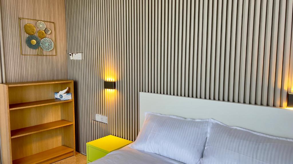 Voodi või voodid majutusasutuse Wadi Shab Beach Villa toas