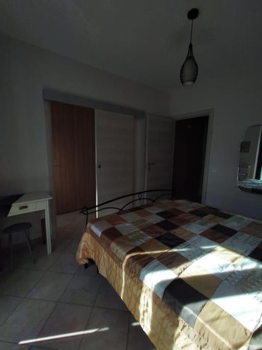 Postel nebo postele na pokoji v ubytování Appartamento Ameria