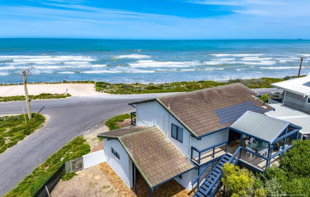 an aerial view of a house with the ocean at The Rise on Surfer- BEACHFRONT Pet Friendly WIFI in Middleton