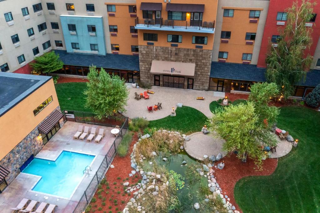 an aerial view of a courtyard with a swimming pool at Stoney Creek Hotel Sioux City in Sioux City
