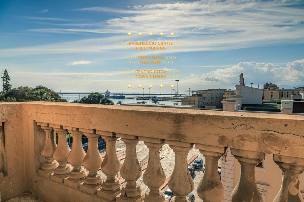 a view of a city from a balcony at Onlyrooms IV - Sea View & Free Parking in Cagliari