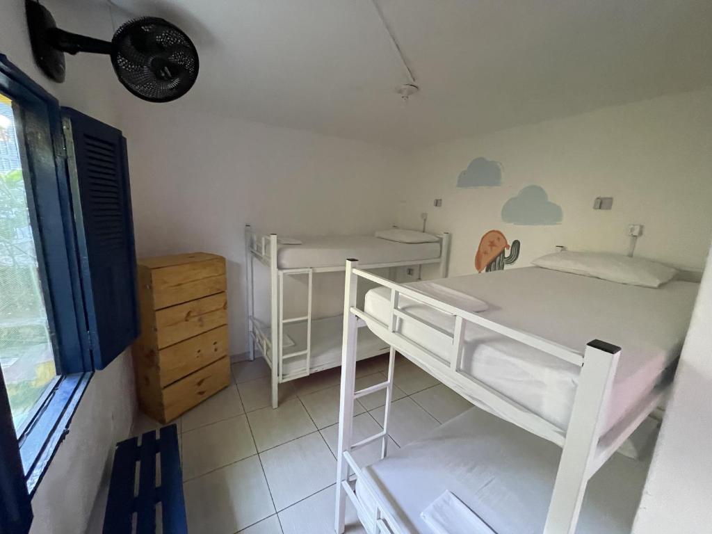 Postel nebo postele na pokoji v ubytování Ooxe Hostel