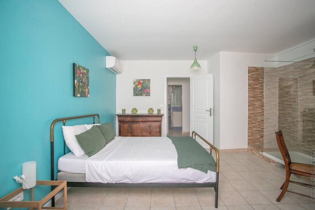 Postel nebo postele na pokoji v ubytování Villa Sol Y Sombra