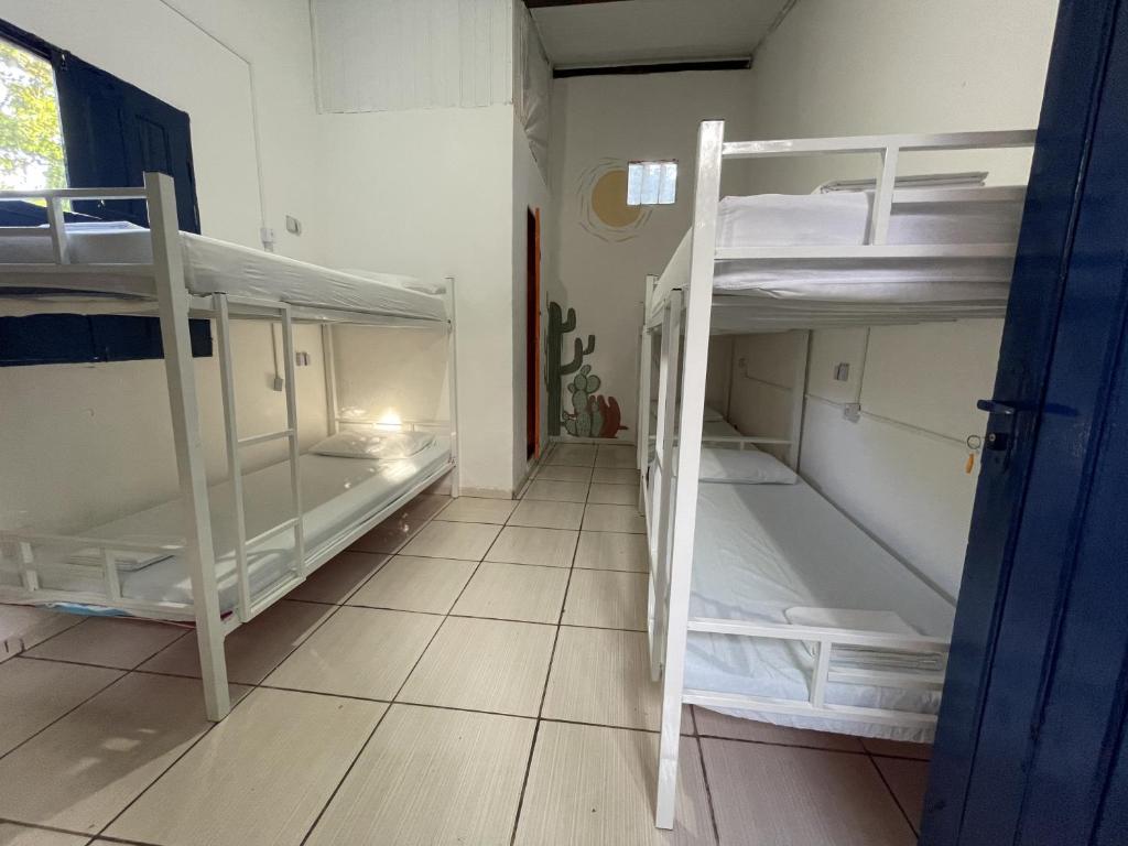 Postel nebo postele na pokoji v ubytování Ooxe Hostel