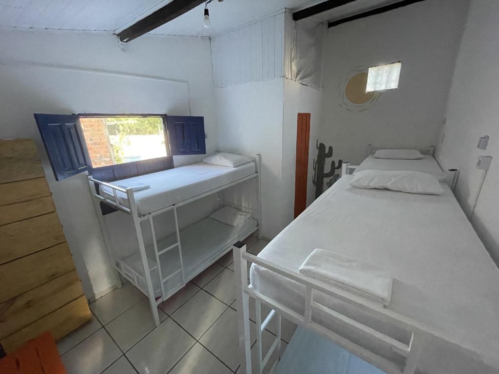Postel nebo postele na pokoji v ubytování Ooxe Hostel