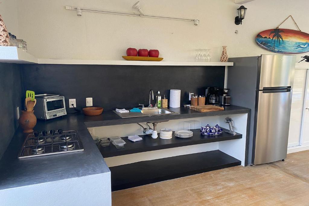Kuchyň nebo kuchyňský kout v ubytování Zandoyo Bed & Breakfast