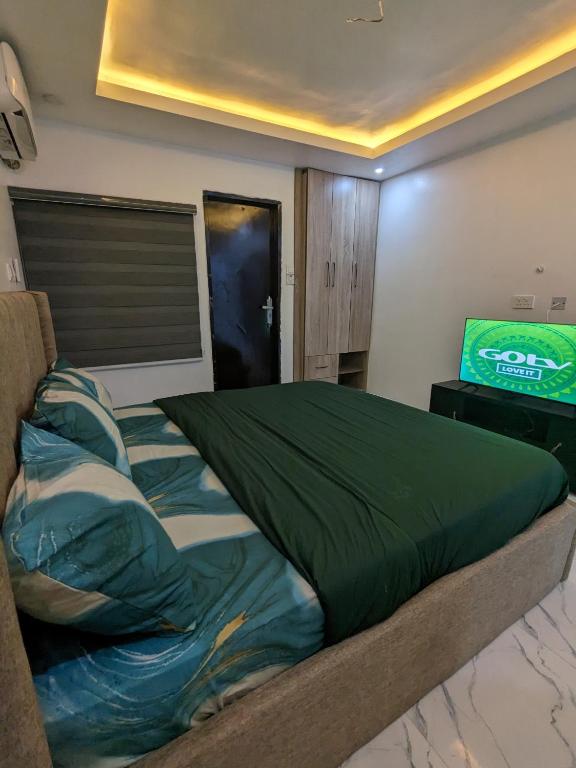 Postel nebo postele na pokoji v ubytování Easyinn Shortlet Apartment