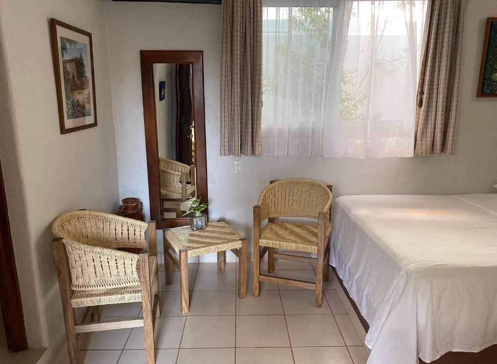 Postel nebo postele na pokoji v ubytování Zandoyo Bed & Breakfast