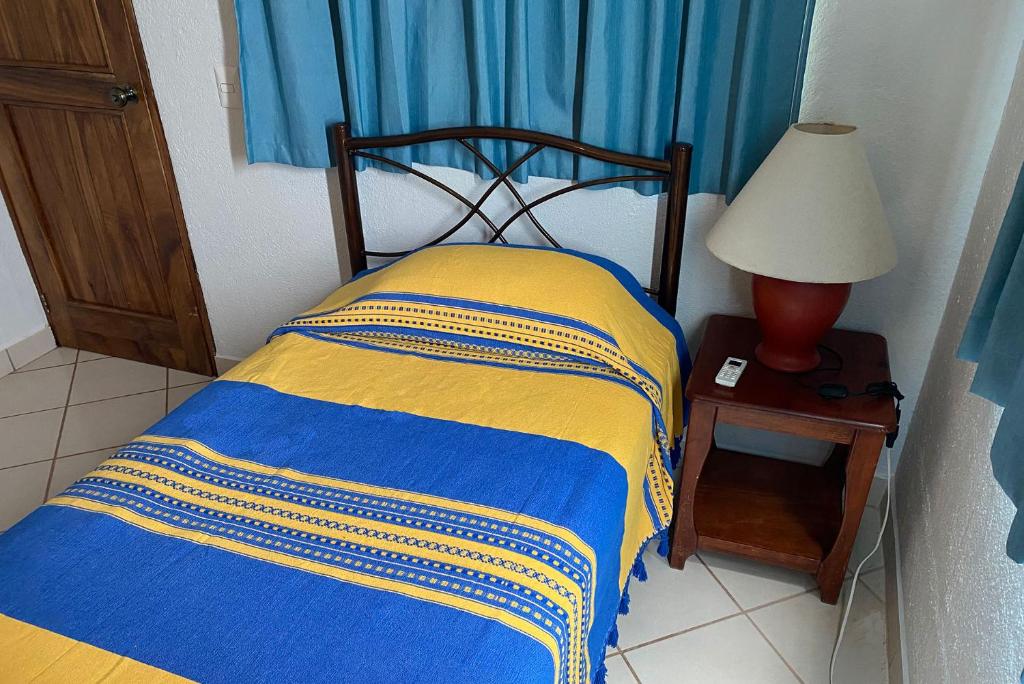 Postel nebo postele na pokoji v ubytování Zandoyo Bed & Breakfast