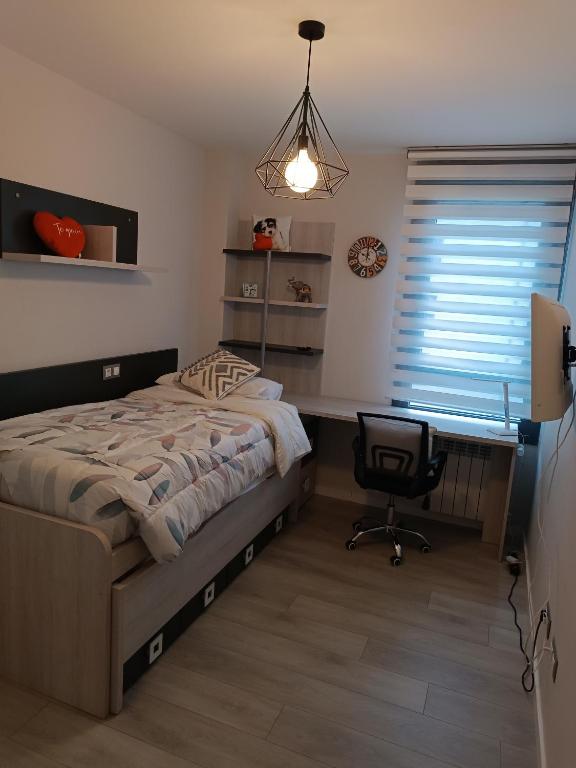 Postel nebo postele na pokoji v ubytování ¡Al lado de la Clínica Oftalmológica Vega!