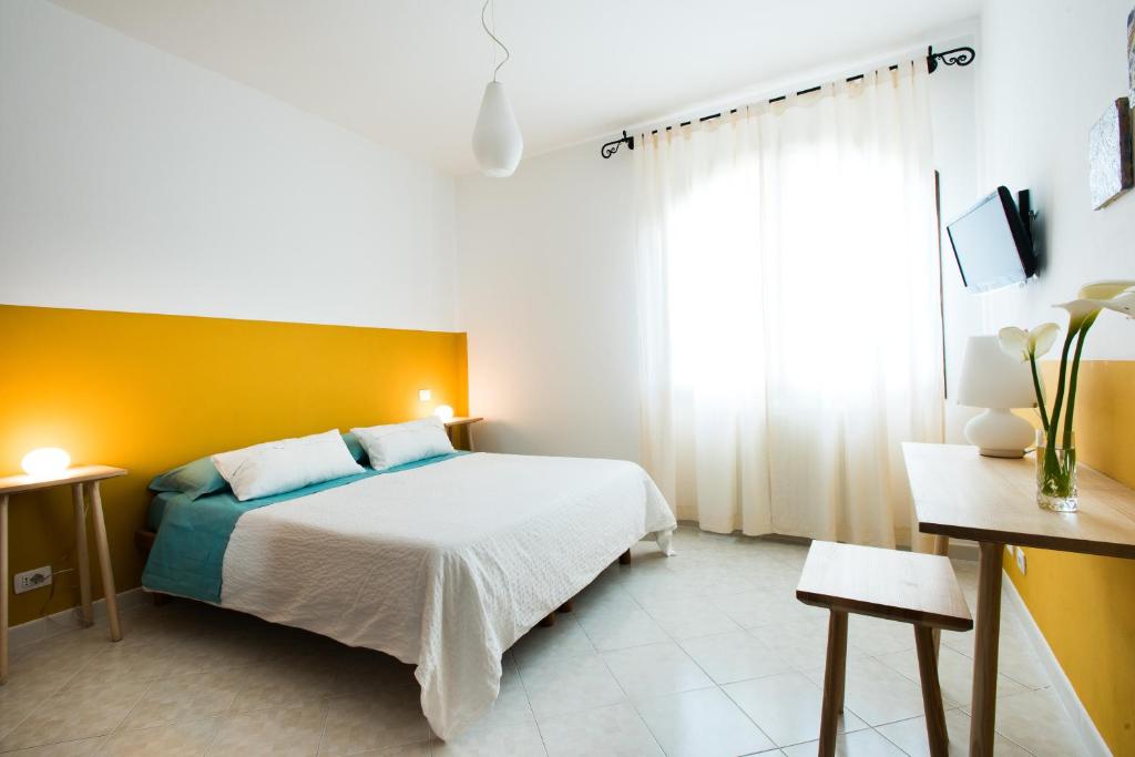 Voodi või voodid majutusasutuse B&B Sa Cruxitta toas