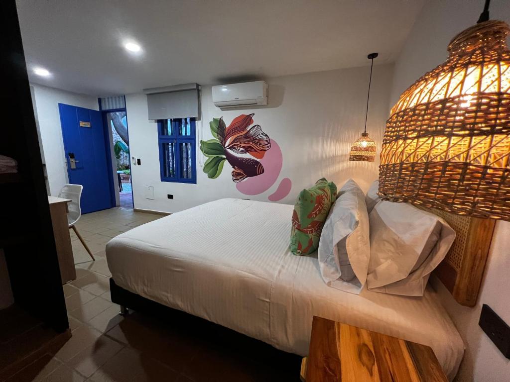 Postel nebo postele na pokoji v ubytování Los Patios Hostel