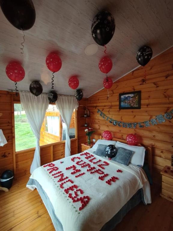 Postel nebo postele na pokoji v ubytování Cabaña La Granja tomine