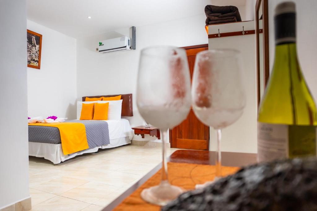 Postel nebo postele na pokoji v ubytování La Zayapa Hotel