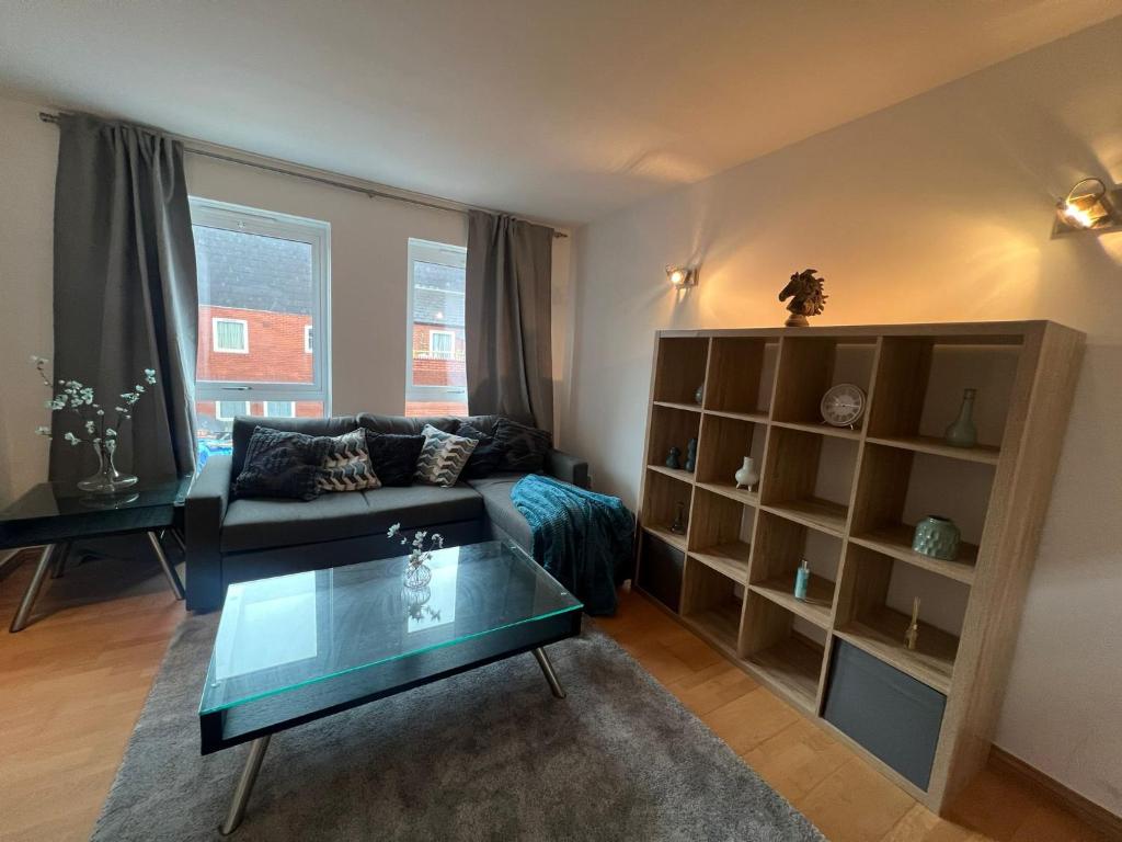 a living room with a couch and a coffee table at 2 Bedroom flat in Leicester Square in London