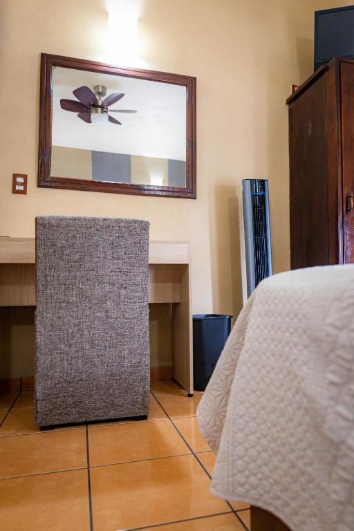 Postel nebo postele na pokoji v ubytování Hotel Estefania