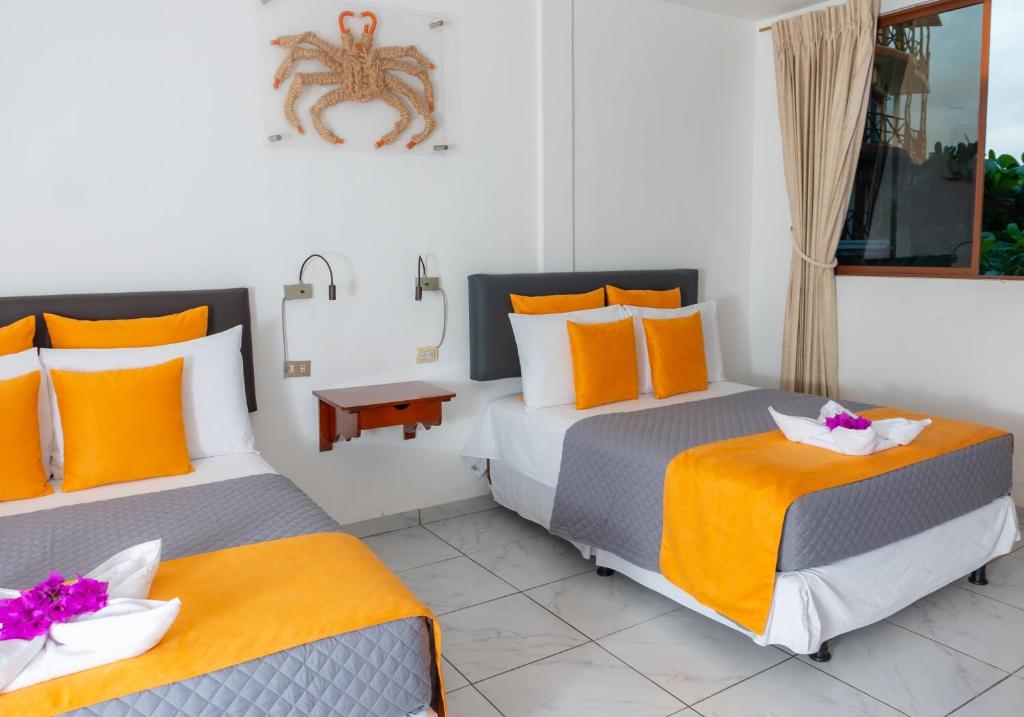 Postel nebo postele na pokoji v ubytování La Zayapa Hotel