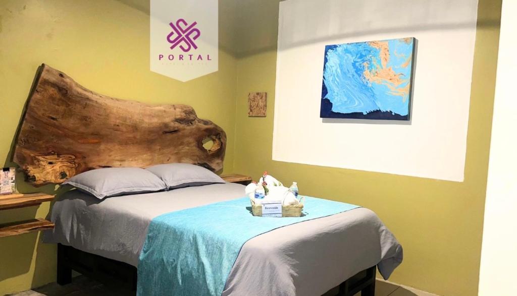 Postel nebo postele na pokoji v ubytování Hotel Portal & Suites