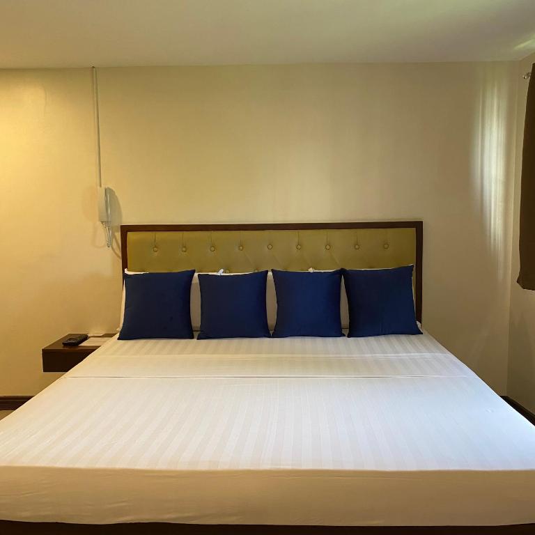Postel nebo postele na pokoji v ubytování Suntal Residences