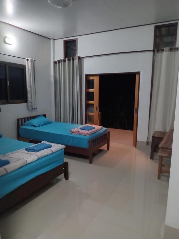 Chom Suan Farmstayにあるベッド