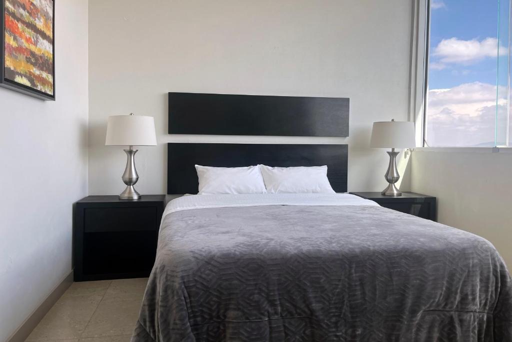 Letto o letti in una camera di Laviu B&B Luxe Suites