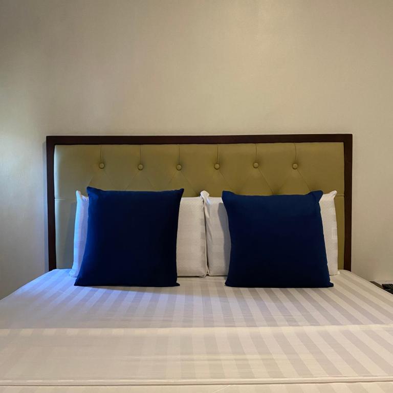 Postel nebo postele na pokoji v ubytování Suntal Residences