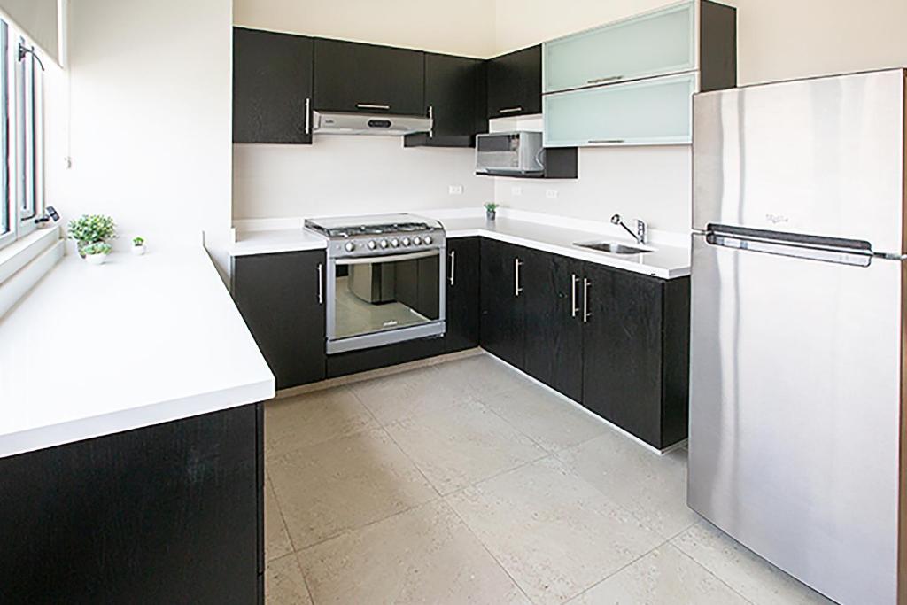 Cucina o angolo cottura di Laviu B&B Luxe Suites