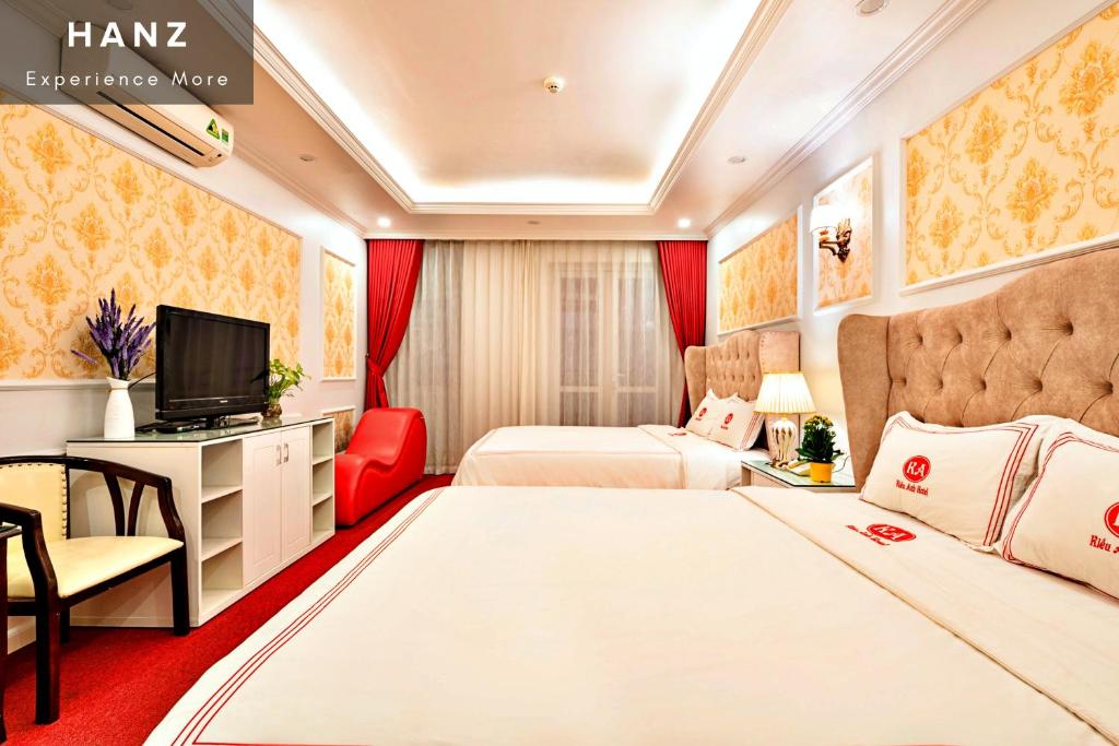Postel nebo postele na pokoji v ubytování S79 Kieu Anh Hotel