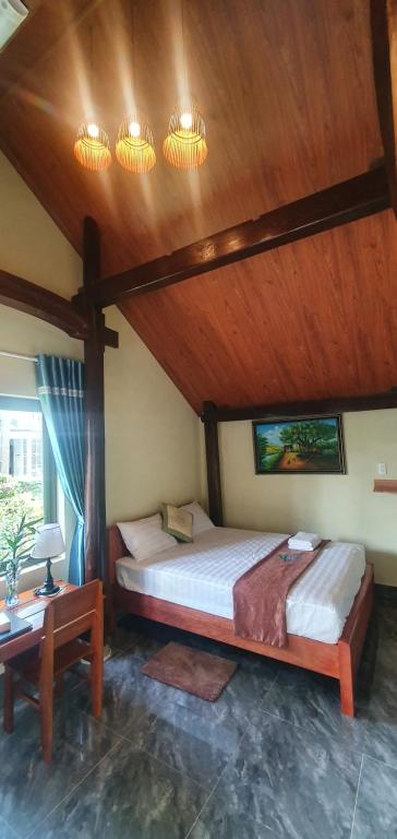 Postel nebo postele na pokoji v ubytování Tam's Homestay