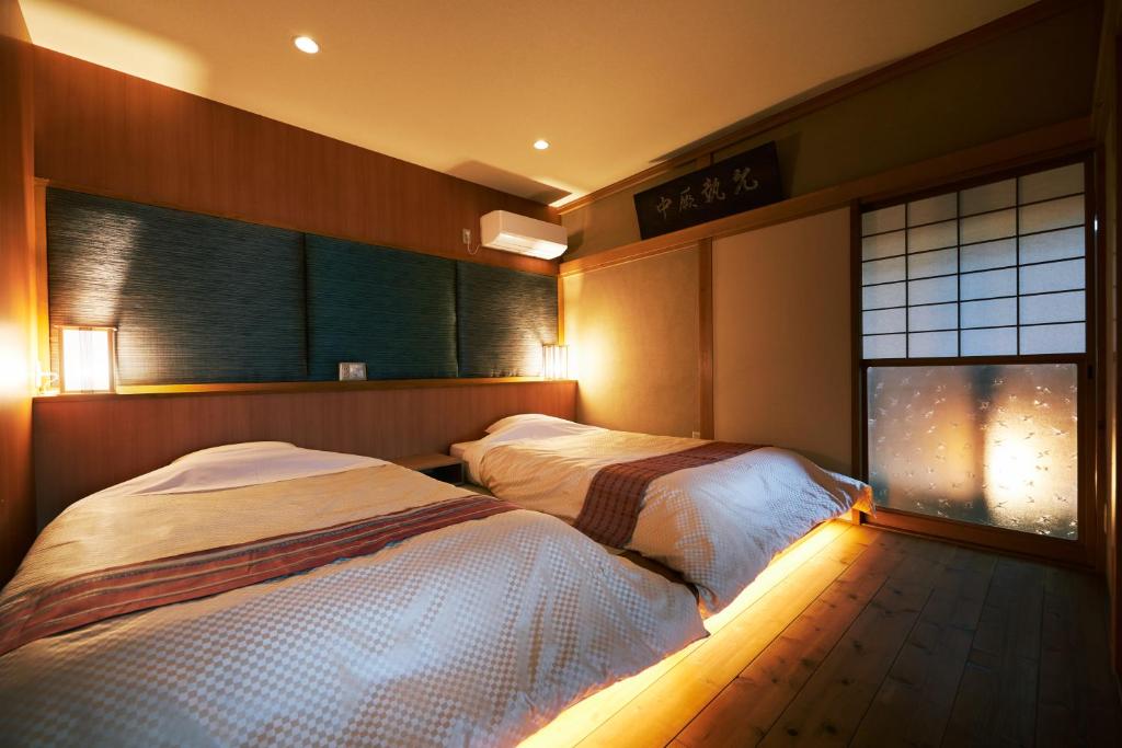 町住客室 秩父宿客房内的一张或多张床位