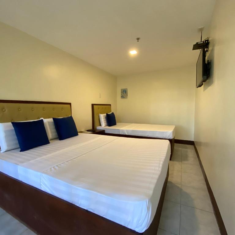 Postel nebo postele na pokoji v ubytování Suntal Residences