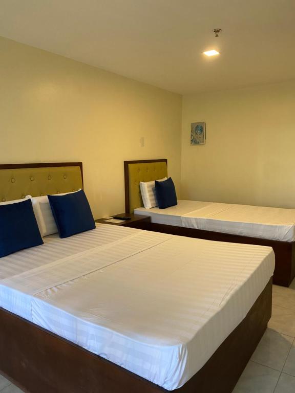 Postel nebo postele na pokoji v ubytování Suntal Residences