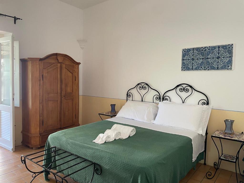 Hotel La Locanda Del Postino - Quadruple Room With Garden View