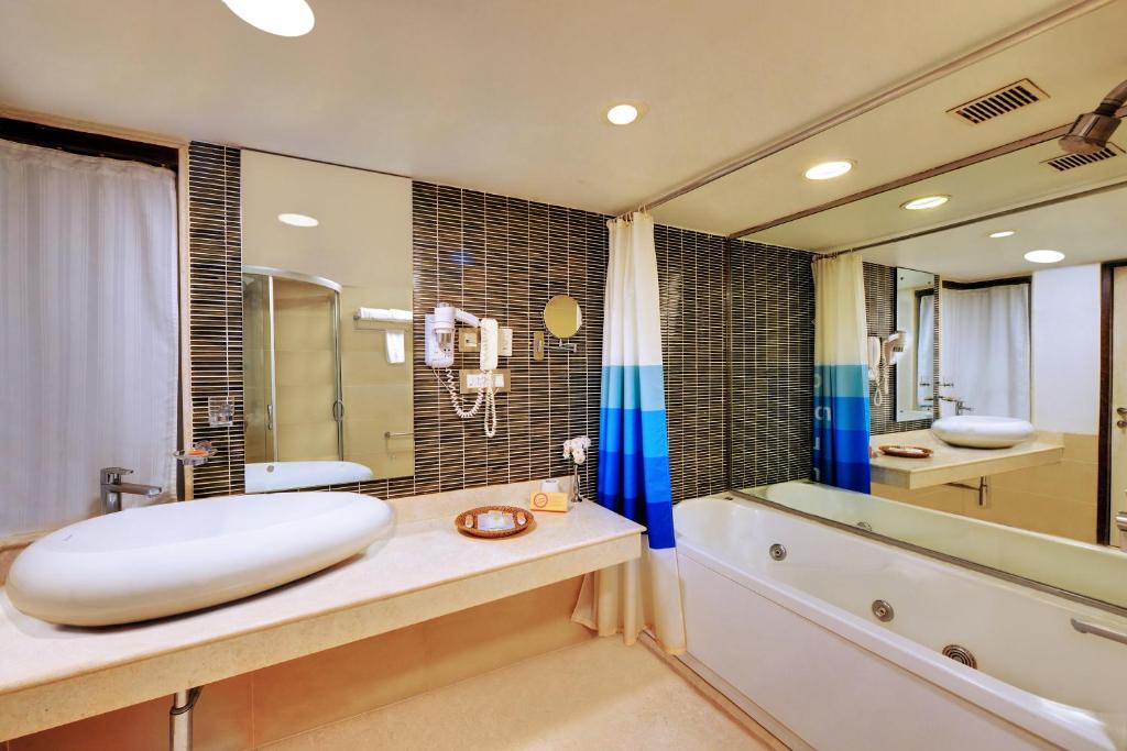 Koupelna v ubytování Iris The Business Hotel