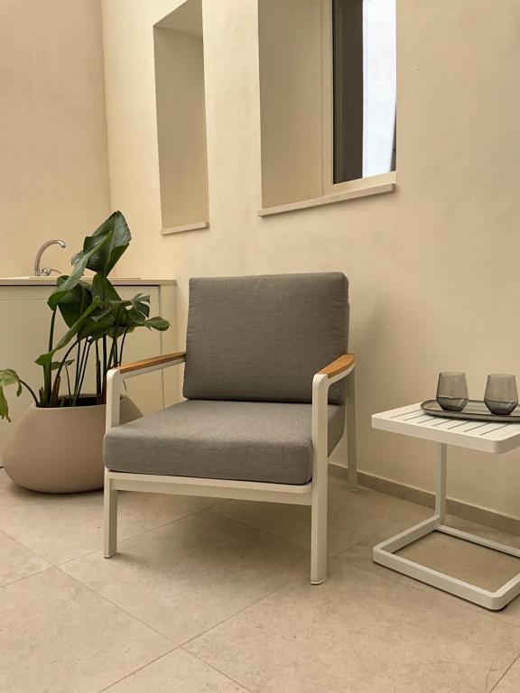 Posezení v ubytování Vigliena rooms by Dimore in Sicily