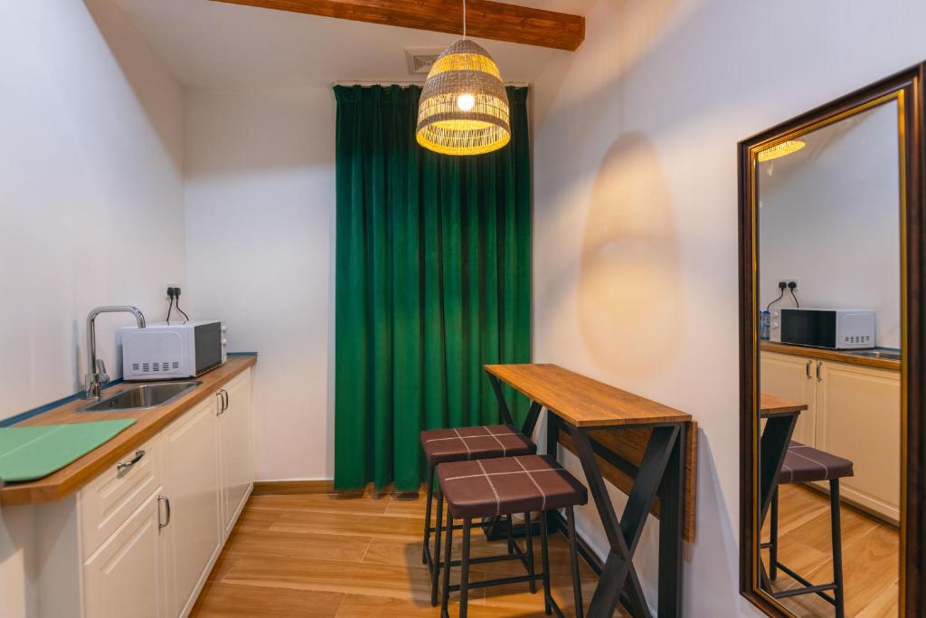 Kuchyň nebo kuchyňský kout v ubytování House 76