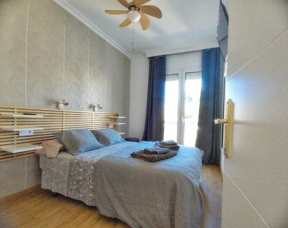 Posteľ alebo postele v izbe v ubytovaní Apartamento Hermosilla