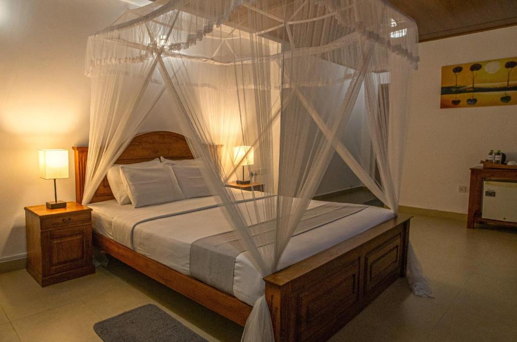 Postel nebo postele na pokoji v ubytování Hotel Onrock