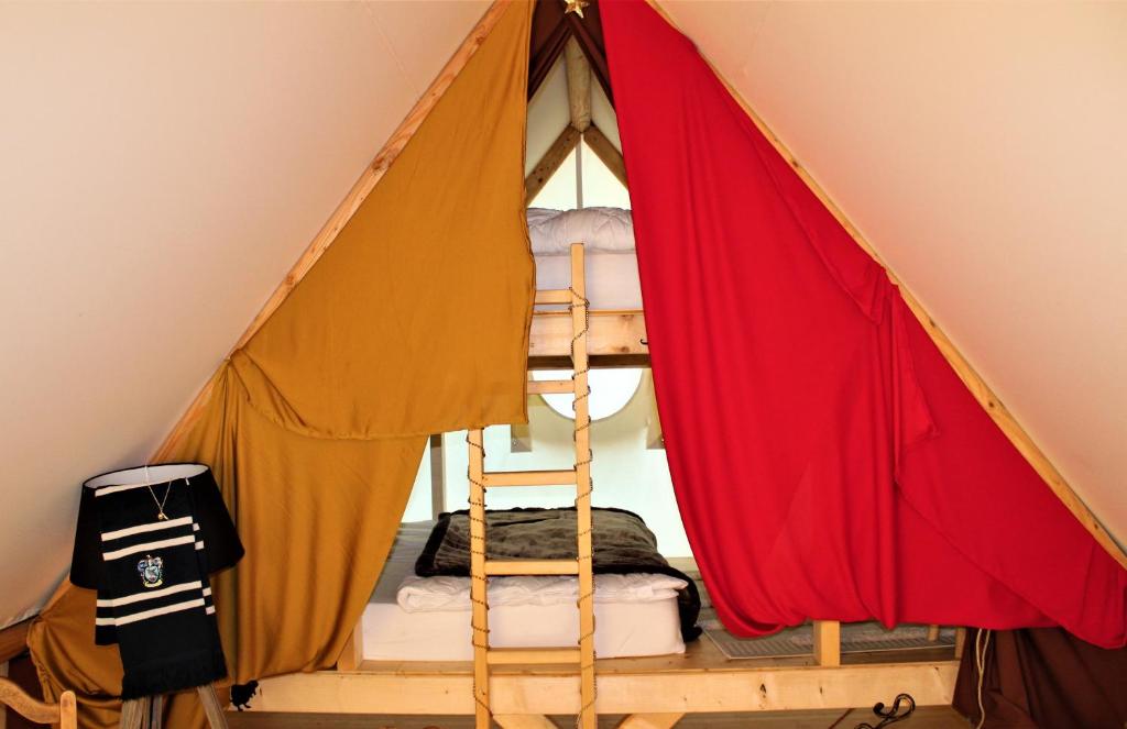 Кровать или кровати в номере Gîte du sorcier - Etat Nature