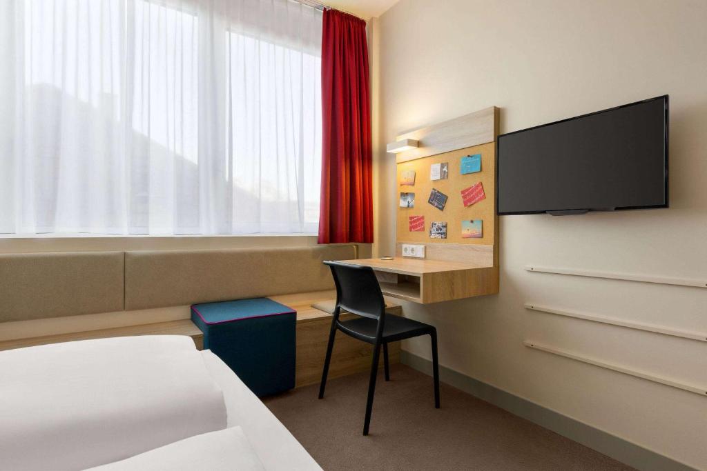 Vienna House Easy by Wyndham München - Resim 21