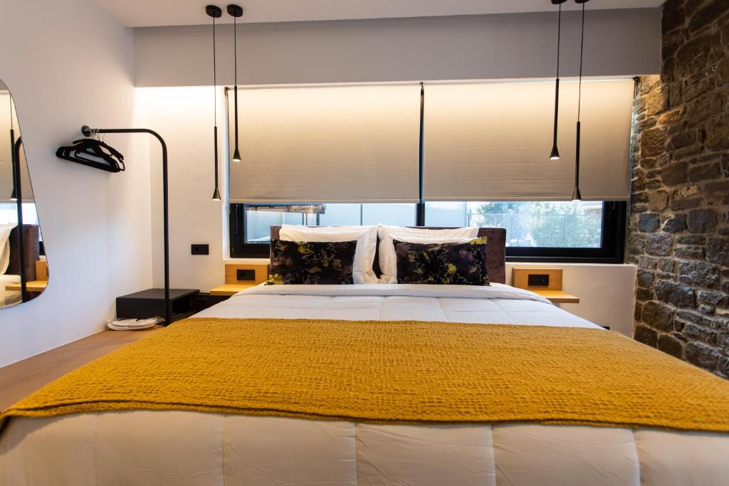 Postel nebo postele na pokoji v ubytování Opal Executive Suites